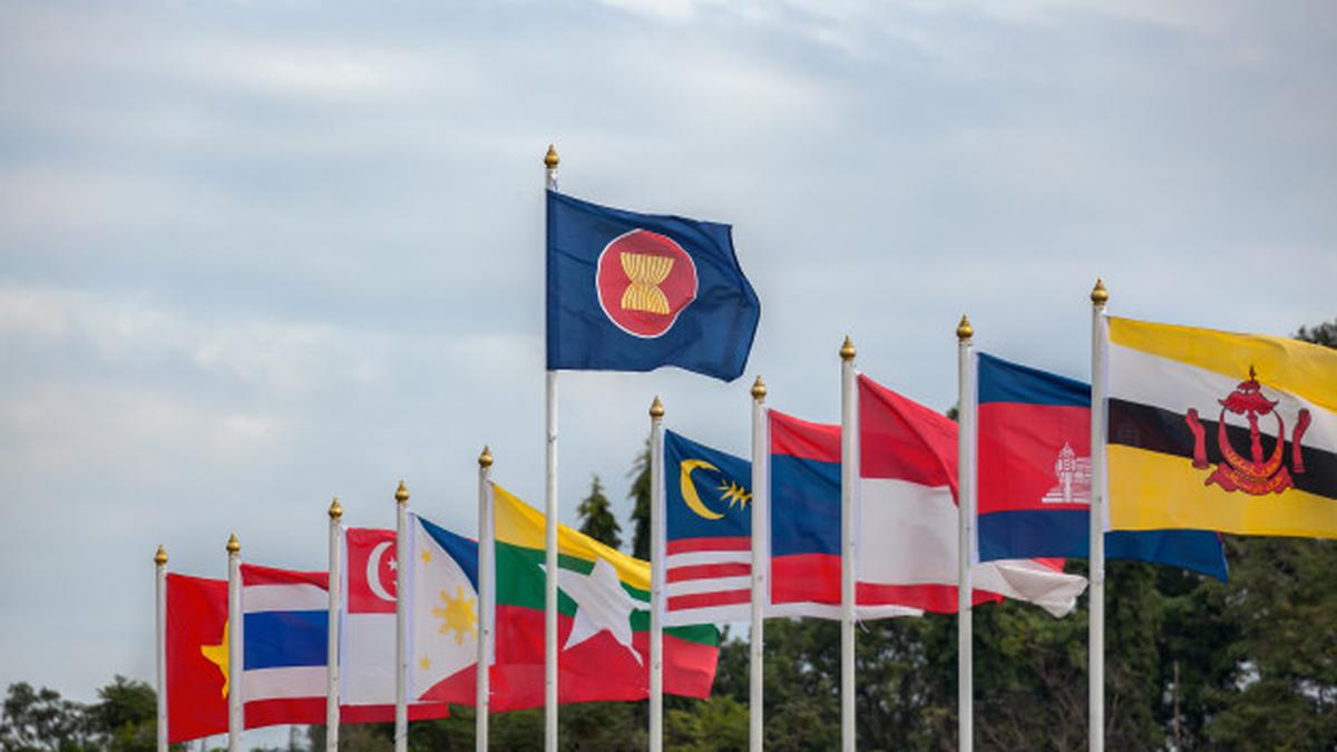 031681900_1622015952-asean-economic-community-flags-southeast-asia-countries-sky-background_40290-17