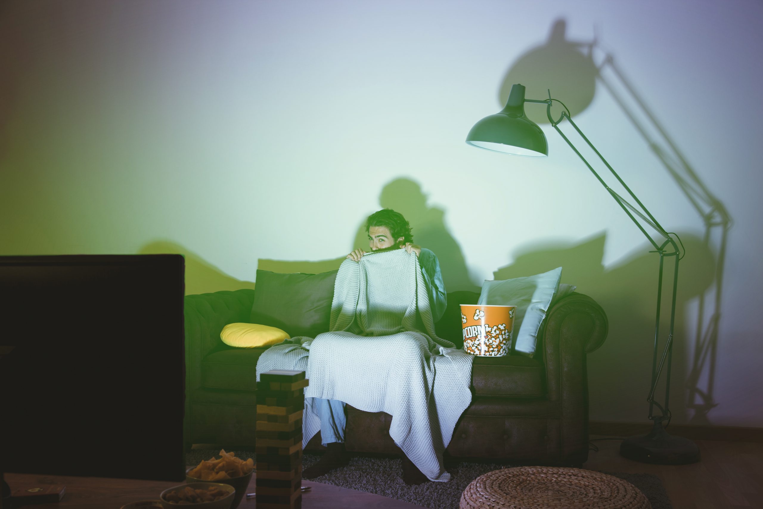 fearful-man-watching-movie